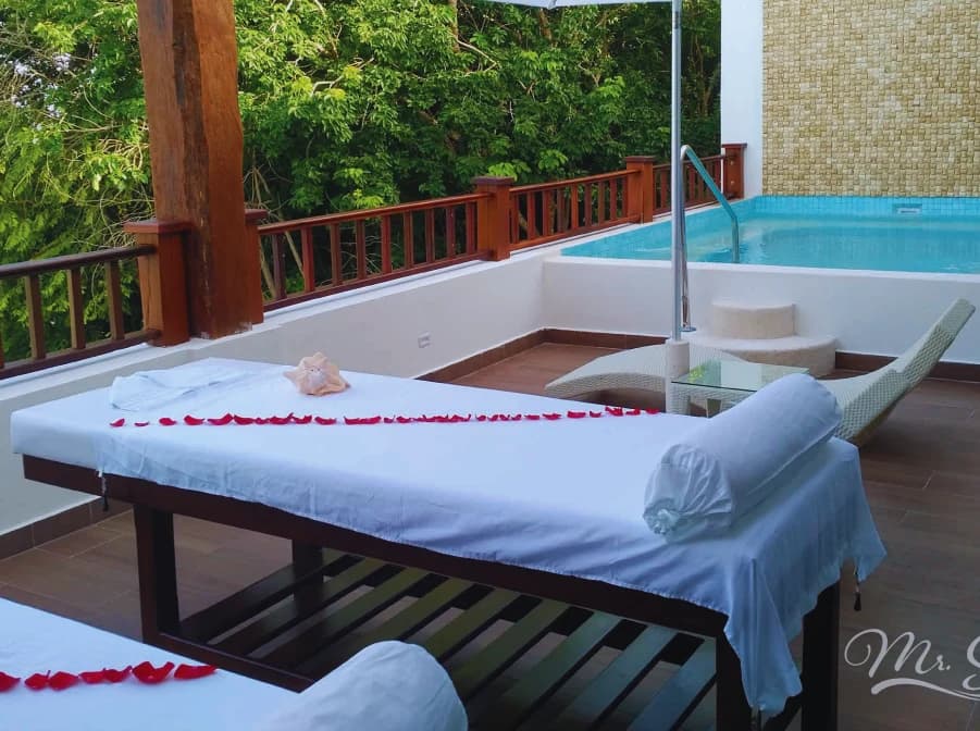 Couple's massage inside a private SPA Suite at Mr. Sancho's